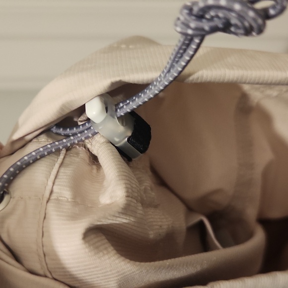 Nike golf windbreaker size medium. Color tan with white contour under arm area. - Picture 5 of 5